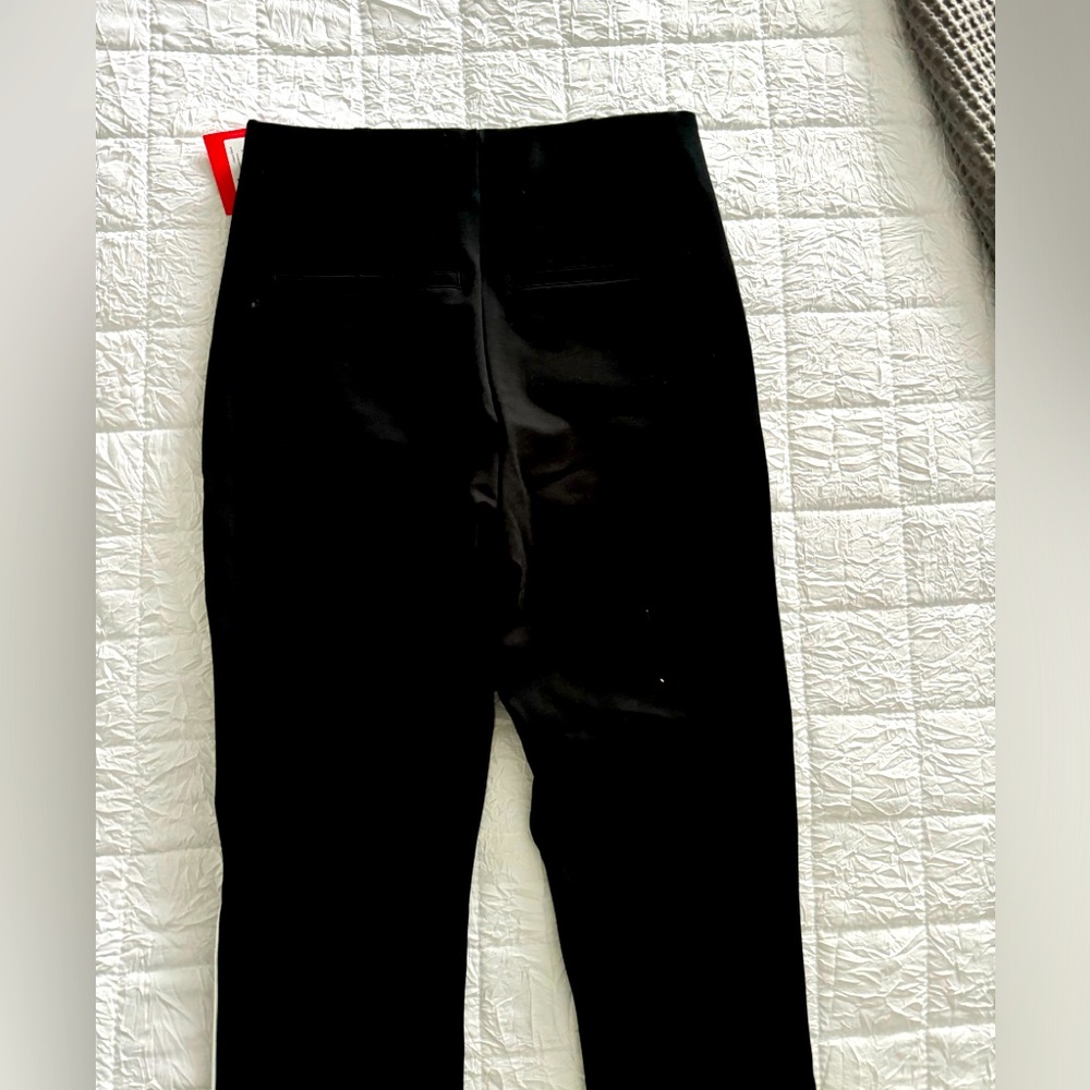 Spanx black pants with white piping down the side, size small